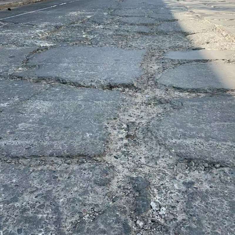 忻府路面起砂露石子修补料